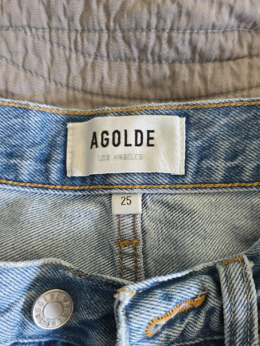 Agolde Light Wash Distressed Denim Cutoff Shorts